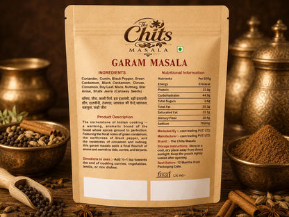 The back of a Garam Masala spice packet by Chit Chikita Masala, displayed against a warm, blurred background of whole spices.