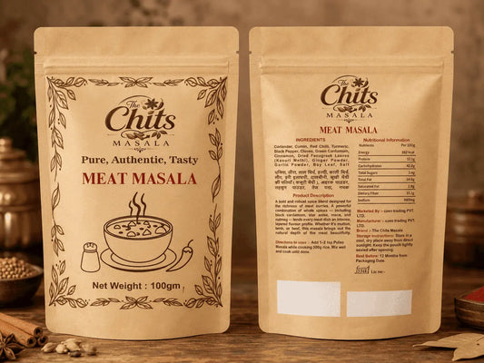 Two stand-up pouches of Chits Masala Meat Masala shown side by side on a wooden surface, with the front label on the left and the back panel on the right.