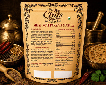 Back of a package of The Chuts Masala Missi Roti Paratha Masala shown in a styled kitchen setting with spices and utensils.